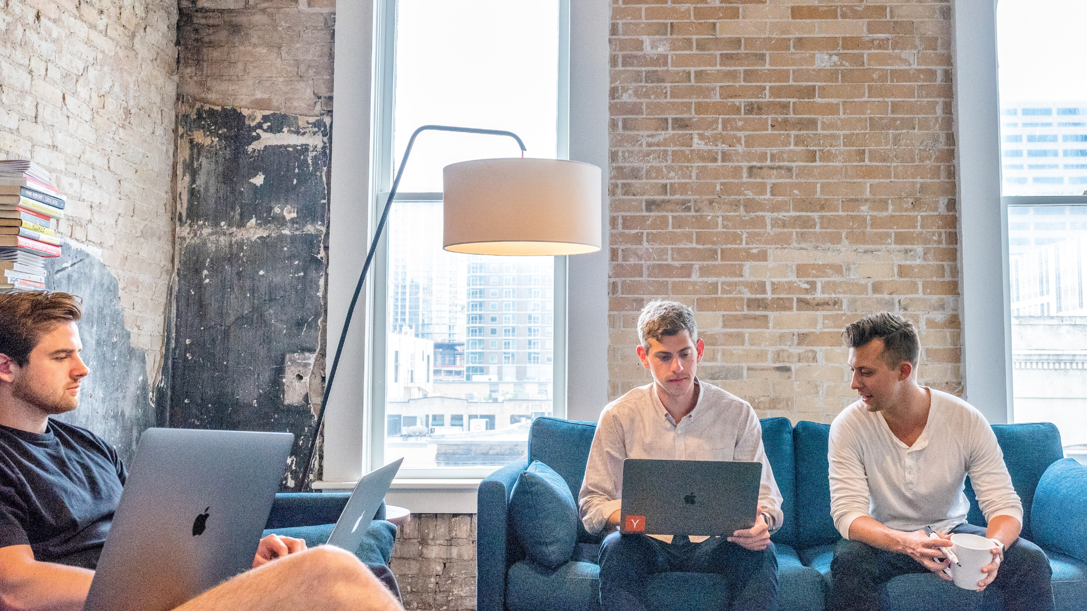 three-men-using-MacBooks