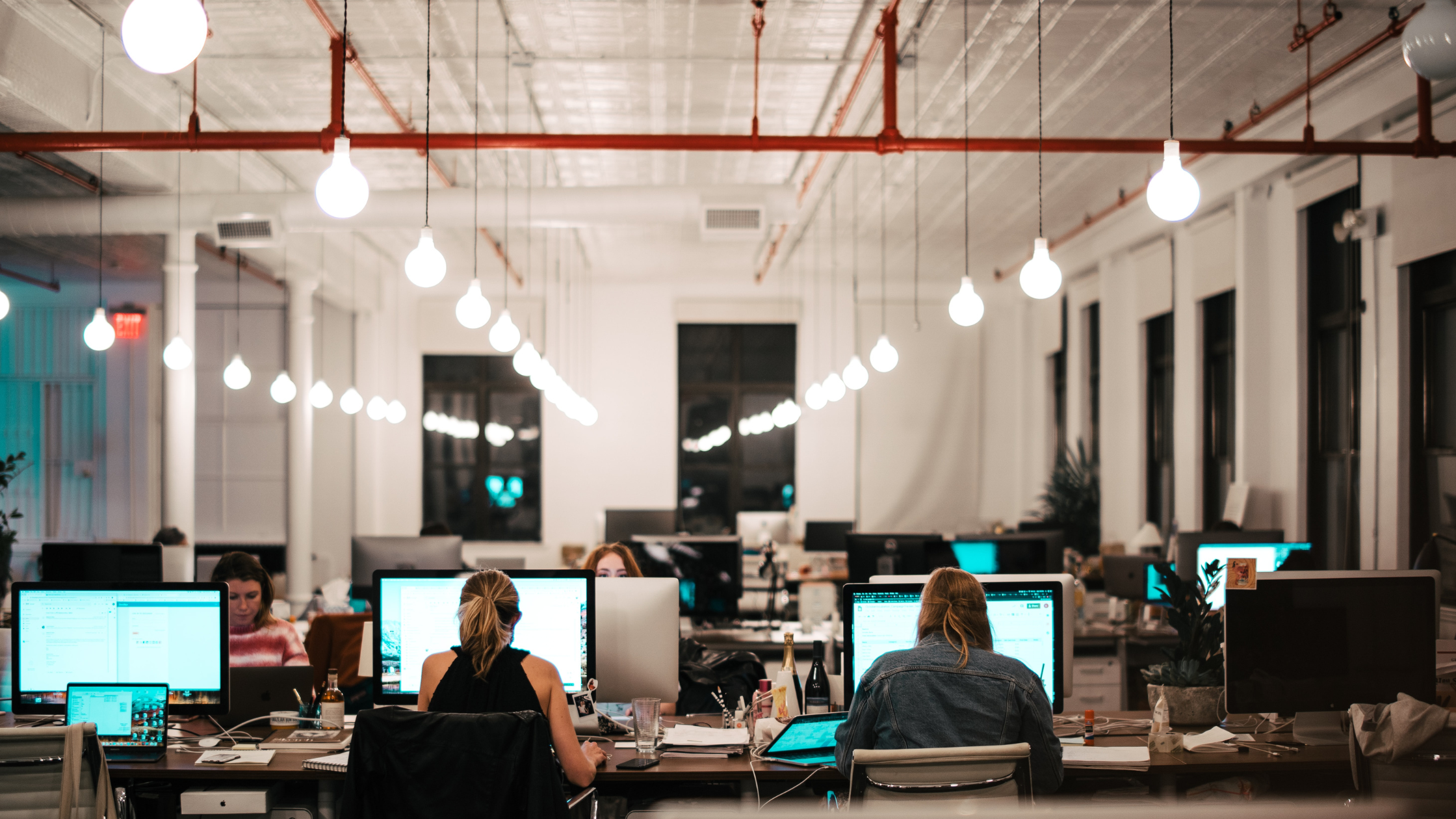 people-sitting-in-chair-in-front-of-computer