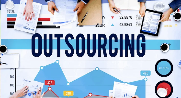 people-working-at-table-outsourcing